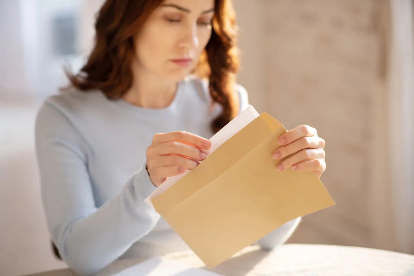 woman-opening-irs-cp2000-notice